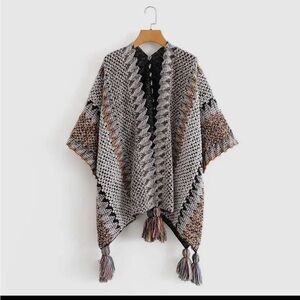 0028.  Multicolor Knit Poncho with Tassels